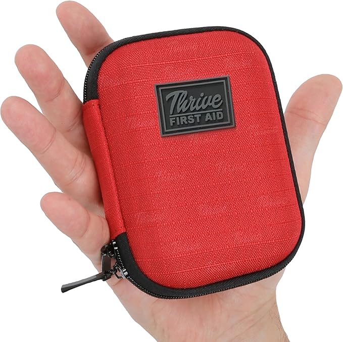 Thrive Travel Essentials Mini First Aid Kit – 66 Pieces of FSA and HSA Approved Supplies Including Bandages, Wipes, Safety Pins, and More | Compact Emergency Kit in Shell Case